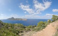 View on the island Sa dragonera covered with green forest surrounded by Mediterranean sea water, Mallorca, Balearic Islands, Spain Royalty Free Stock Photo