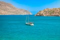 View of the island of Spinalonga with calm sea. gulf of Elounda, Crete, Greece