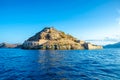 View of the island of Spinalonga with calm sea. Here were isolated lepers, humans with the Hansen`s desease, gulf of Elounda.