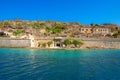 View of the island of Spinalonga with calm sea. Here were lepers, humans with the Hansen`s desease, gulf of Elounda. Royalty Free Stock Photo