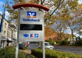 View on isolated german volksbank sign of bank branch in small village