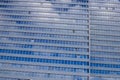 View on isolated glass facade of skyscraper with countless windows and reflection of clouds and sky - DÃÂ¼sseldorf, Germany Royalty Free Stock Photo