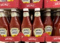 View on isolated Heinz tomato ketchup bottles in shelf of german supermarket