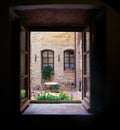 View of the Italian courtyard through the window