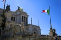 View of Italian national flag in front of Altare della Patria Altar of the Fatherland , the equestrian sculpture in Rome, Italy Royalty Free Stock Photo