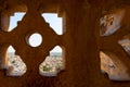 View of Jaisalmer city through sandstone made beautiful jharokha, stone window. Interior of Rani Mahal or Rani Ka Mahal, inside