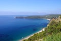 Panoramic view from above to the Adriatic sea coastline and Jaz beach near a Budva city, Montenegro. Royalty Free Stock Photo