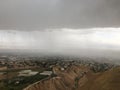 View of Jericho and Dead Sea from Mount of Temptation in Palestine during Rain in April. Royalty Free Stock Photo