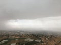 View of Jericho and Dead Sea from Mount of Temptation in Palestine during Rain in April.