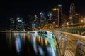 View from Jubilee bridge with Singapore skyline and Merlion at n