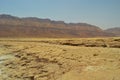 View of the Judean mountains and the coast from the salt of the Dead Sea Royalty Free Stock Photo