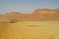 View of the Judean mountains and the coast from the salt of the Dead Sea Royalty Free Stock Photo