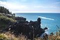 View of the Jusangjeollidae. Jusangjeolli are stone pillars piled up along the coast and is a designated cultural monument of Jeju