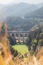 View of the Kalte Rinne railway viaduct and a passing train in Semmering, Rax-Schneeberg Group, Styria, Austria