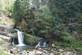 View of Kamyanka waterfall in the Carpathian forest in Ukraine Royalty Free Stock Photo