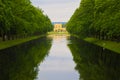 View in Karlsaue Park over the water canal with its tree-lined avenues to the Orangerie.in Kassel Royalty Free Stock Photo