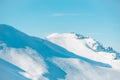 View of Kasprowy Wierch on a sunny and wintry day. Many people at the summit. Tatra National Park, Poland