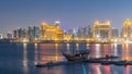 View from Katara Beach day to night timelapse in Doha, Qatar, towards the West Bay and city center Royalty Free Stock Photo