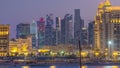 View from Katara Beach day to night timelapse in Doha, Qatar, towards the West Bay and city center