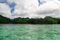 View from kayak on cloudy Rarotonga Island, Cook Islands, Oceania Royalty Free Stock Photo