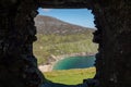 View on Keem beach from a window of an old building. Achill island, county Mayo, Ireland. Beautiful sandy beach with clear blue Royalty Free Stock Photo