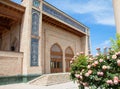 View of the Khast Imam Mosque through the bushes with roses. Tashkent, Uzbekistan. Apr 29, 2019