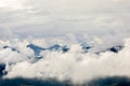 View of Kitzbueheler Alpen mountains in clouds