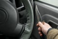 View of the knife in the hand of the driver