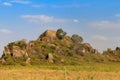 View of kopje rocks in endless savannah in Serengeti National Park, Tanzania Royalty Free Stock Photo