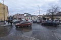 View of the Koriatovycha square, one of landmarks of Uzhgorod. Cars driving, people walking