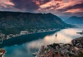 View of Kotor bay at sunset. Dramatic overcast sky. Lovcen Mountains in Montenegro. Adriatic sea. Royalty Free Stock Photo