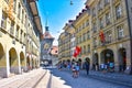 View of Kramgasse shopping street with clock tower in the old town of Bern city Royalty Free Stock Photo