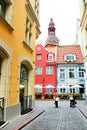 View from Kramu Street to the old buildings with one of the oldest restaurant 1221 on the Jauniela street and Riga cathedral