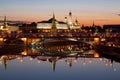 View of the Kremlin, Big stone bridge, Moscow river and their mirror image in the water at dawn, Moscow Royalty Free Stock Photo