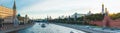 the Kremlin and Sofia embankments from the Bolshoi Moskvoretsky bridge in summer at sunset - panorama Royalty Free Stock Photo