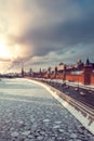 View of Kremlin and winter Moscow river at sunset