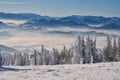 View from Kubinska Hola ski slope with ski lift during winter