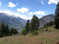View of Kullu Valley and the mountains overlooking Manali town from camp site at Tilgan, Himachal Pradesh, India- Royalty Free Stock Photo