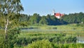 Typical LIthuania landscape . View on Kurtuvenai church.