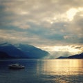 View of Lago di Como at the sunset. Aged photo.