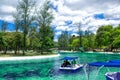 View of the lagoon with a catamaran with pedals Water bike, in the public park of La Carolina in the north of the city of Quito