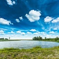 View on lake and beautiful cloudy skyes Royalty Free Stock Photo