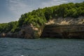 View from the lake at beautiful rocky cliff and forest , Pictured Rocks National Lakeshore Royalty Free Stock Photo