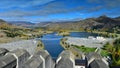 View of Lake Benmore from the top of the dam that powers the hydroelectric power station, in Canterbury Royalty Free Stock Photo