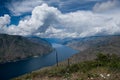 View of Lake Chelan Washington, dark clouds covering mountain top