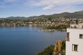 View of the lake and the city of Lugano on a sunny summer day. Royalty Free Stock Photo