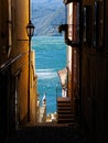 View on Lake Como through a bystreet of Varenna Royalty Free Stock Photo