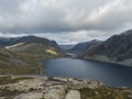 View of the Lake Djupvatnet from raod to mountain Dalsnibba plateaua. Norway, early autumn, cloudy day. Travel Holiday Royalty Free Stock Photo