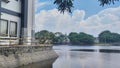 The view of the lake beside a mosque that looks calm