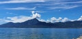 View of the lake and the mountain formation from the east side to the west side of the lake in beautiful weather with blue sky Royalty Free Stock Photo